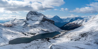 Hiking up Packers Pass Peak. Views back over Ptarmigan Lake to Redoubt Mountain.