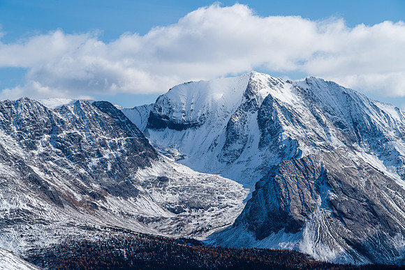 Tilted (R) looks tiny in front of Lychnis Mountain.