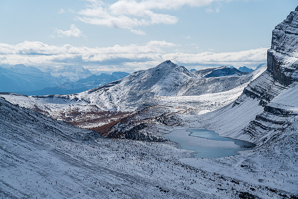 Unity Peak over a mostly frozen Redoubt Lake.