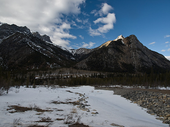 Only the summit is bathed in sunlight as I tramp back up the creek to my car.