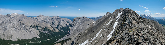 Ascending the west ridge of Gibraltar Mountain with views down the Sheep River (L).