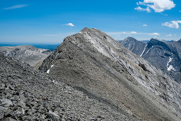 Traversing from the false to the true summit.