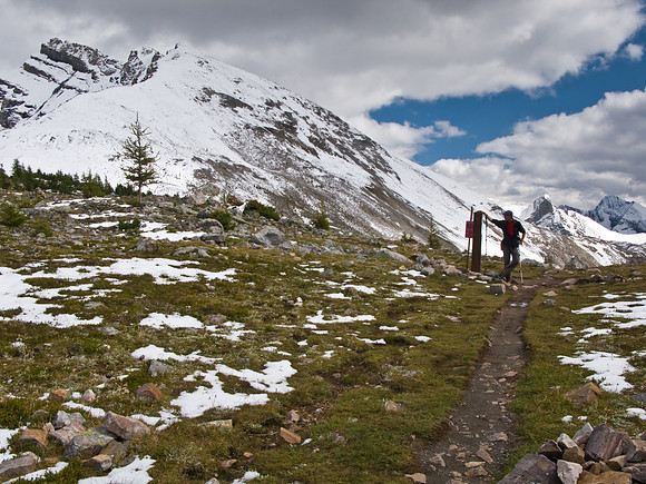 Rod at the BC / Alberta border at Wonder Pass. Wonder Peak on the left.