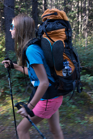 KC marches up the trail.