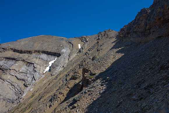 Looking back at a particularly large and long scree ledge I followed from just before getting down to the col on descent.