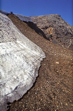 Coming down past the snow patch on the east ridge above Big Shovel Pass.
