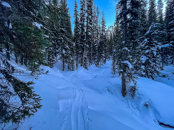 Skiing up the scenic Headwall Creek.