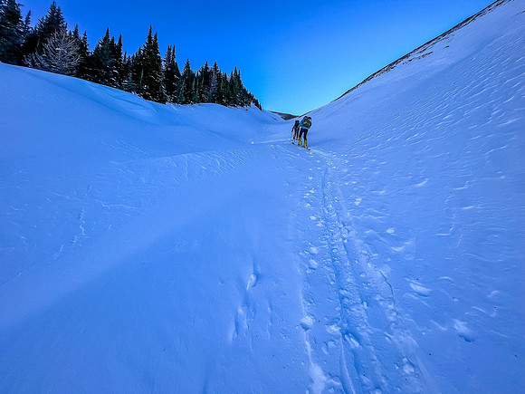 Skiing up the NW access drainage.