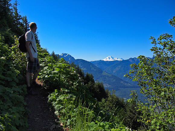 Josh looks over at the always-impressive Mount Baker from a point on the trail where the hiking becomes a bit more of a scramble.