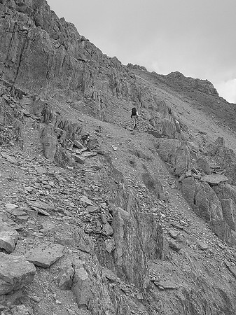 Loose terrain to the false summit.