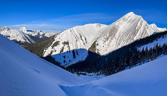 Skiing up the NW access drainage. View back to Mount Chester.