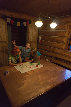 The Elk Lakes ACC Hut is cozy at night.