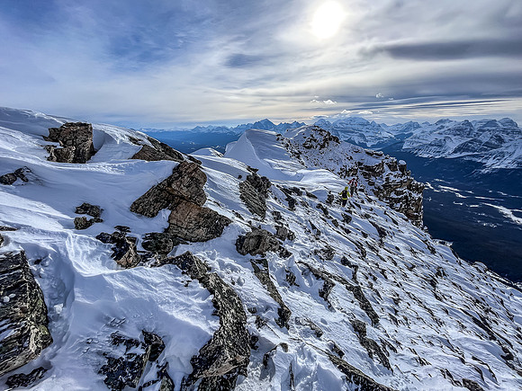Returning in high winds along the south ridge.
