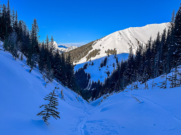 Skiing up the NW access drainage.