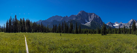 Nearing the hut, Petain waterfall / basin / mountain is at the base of the mountains far in the distance at the right.