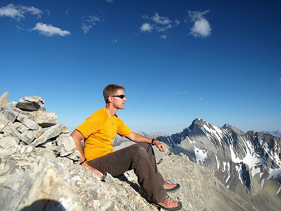 Vern on the summit with Storm Mountain to the south.