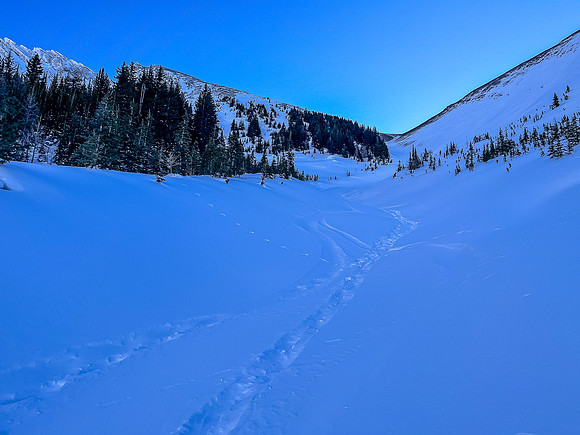 Skiing up the NW access drainage.