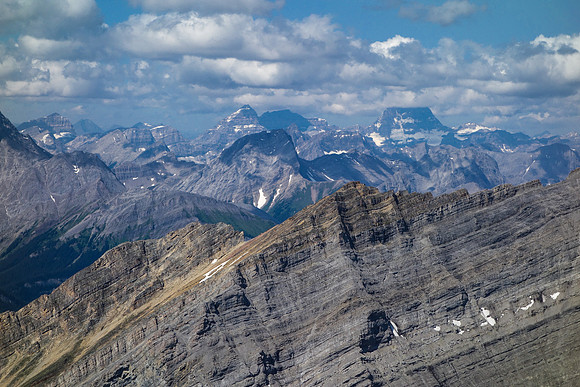 Mount Assiniboine makes a partial appearance with Eon and Aye to its left and Smuts in the foreground at center.