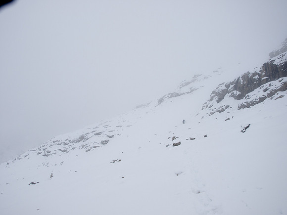 Descending a snowy mountain.