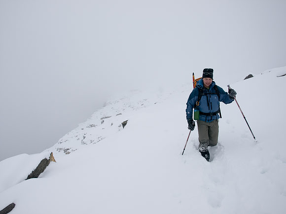 Descending a snowy mountain.