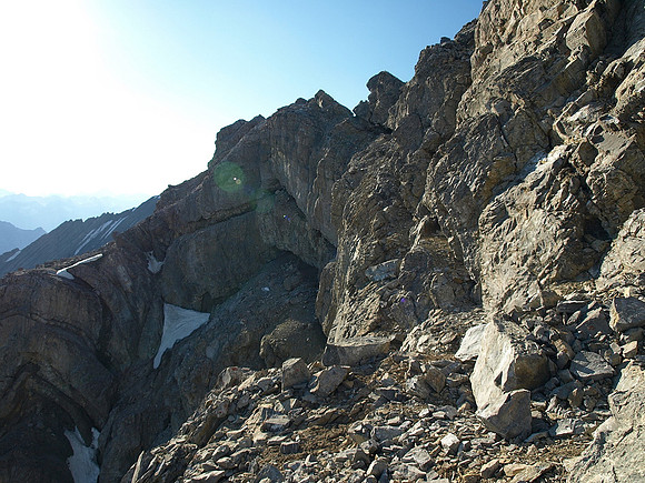Heading back along the summit ridge.