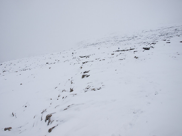 Descending a snowy mountain.